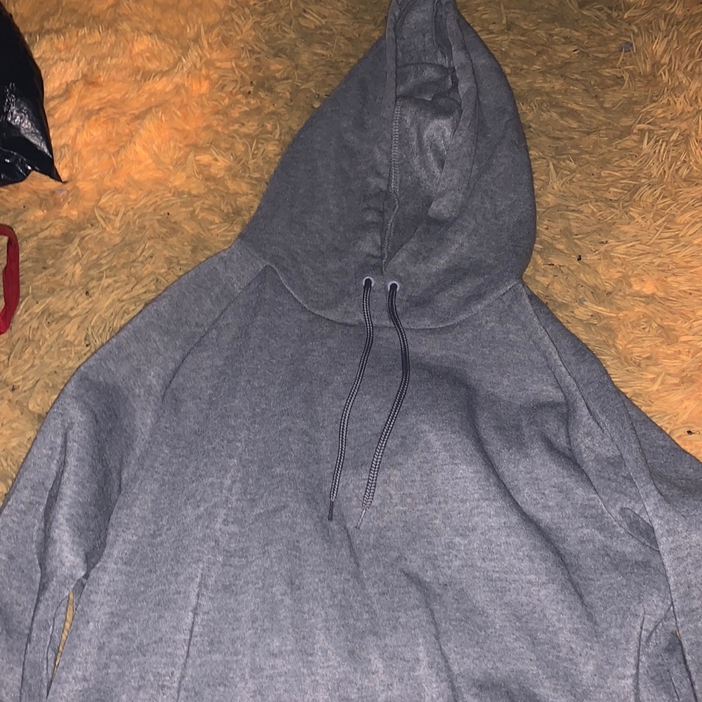 Grey cropped hoodie with elastic waist and sleeves. Size Large fits like medium.